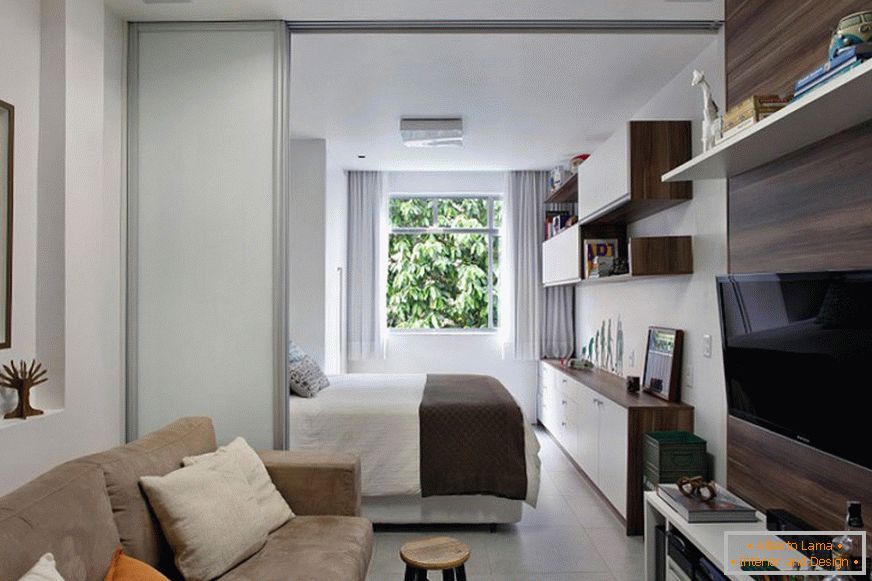 Cozy design of a narrow apartment of 27 square meters