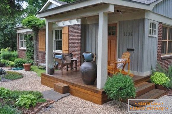 Decoration of a small verandah with a wooden floor