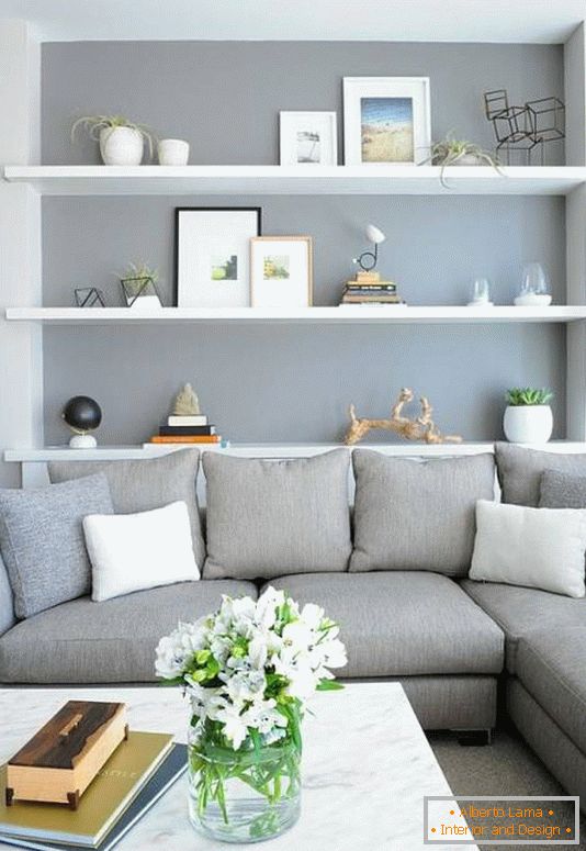 Modern living room with decor on shelves