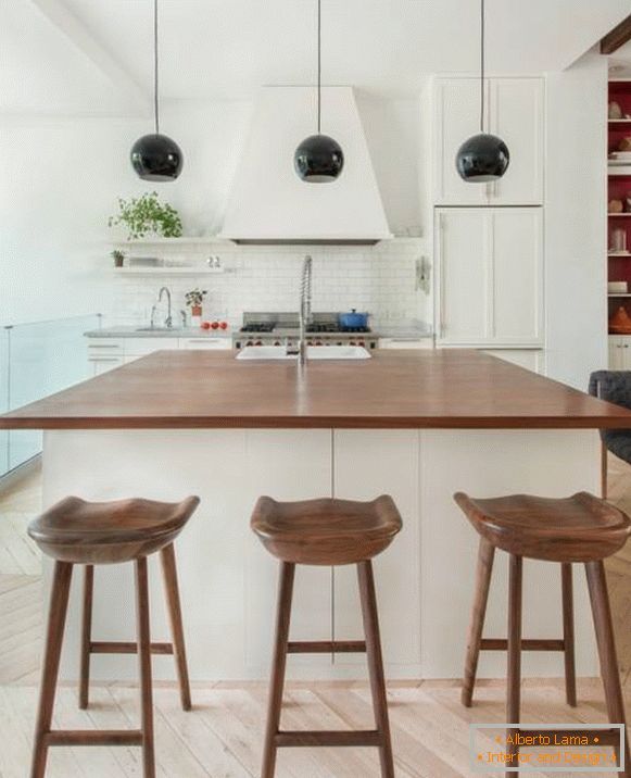 White kitchen with wooden details