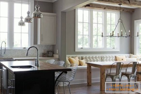 Kitchen island and dinette in the rustic kitchen