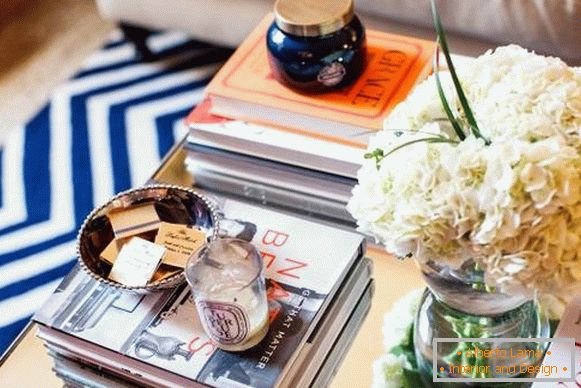 Books on a coffee table with a different decor