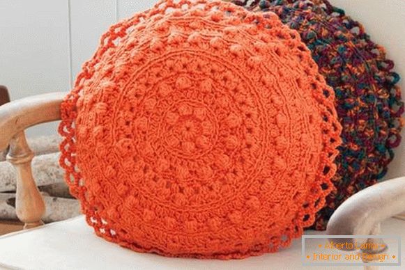 Bright and beautiful pillows on the sofa - photo made by crochet