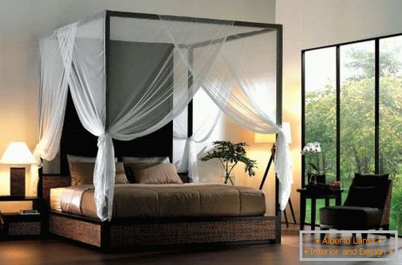 Transparent canopy on a black bed