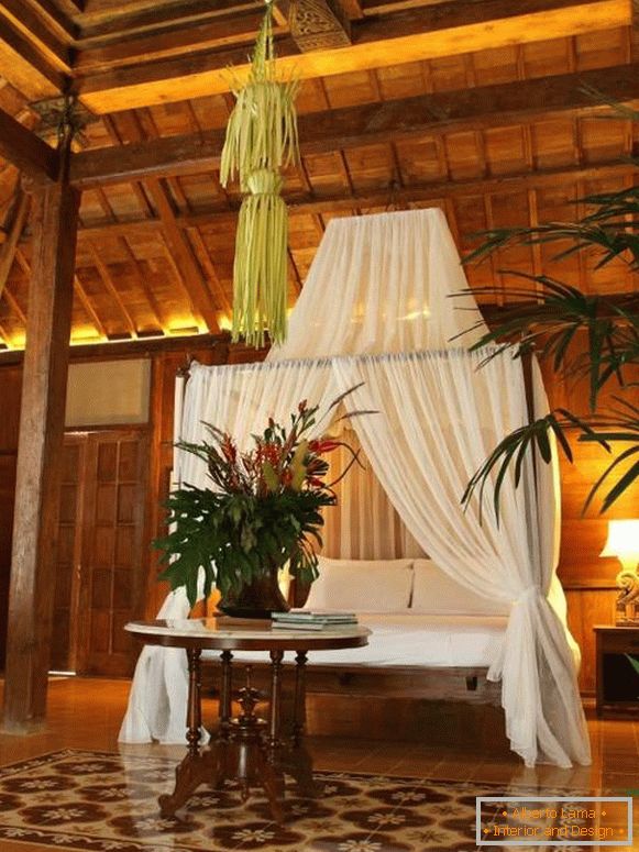 Bedroom with canopy in tropical style