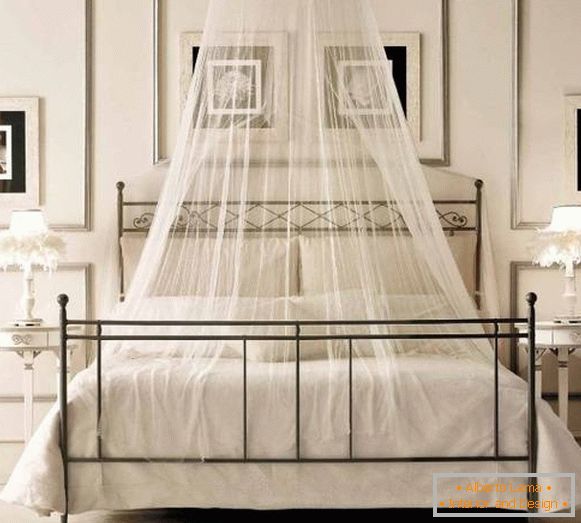 A small canopy ring above the bed