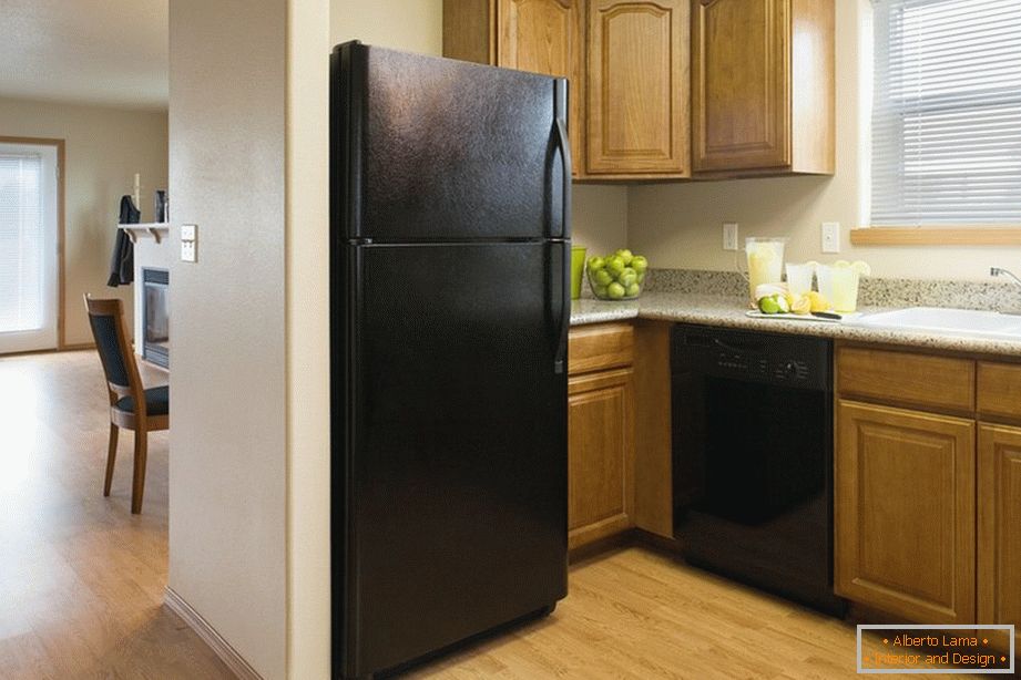 Refrigerator in the interior of the kitchen