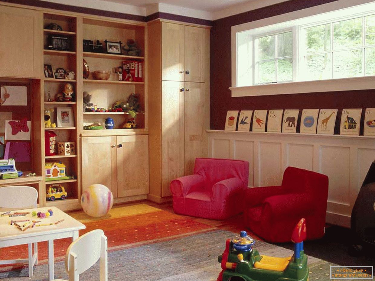 Two red armchairs in the children's room