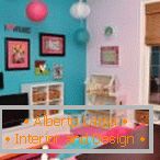 Turquoise and pink in the design of the nursery