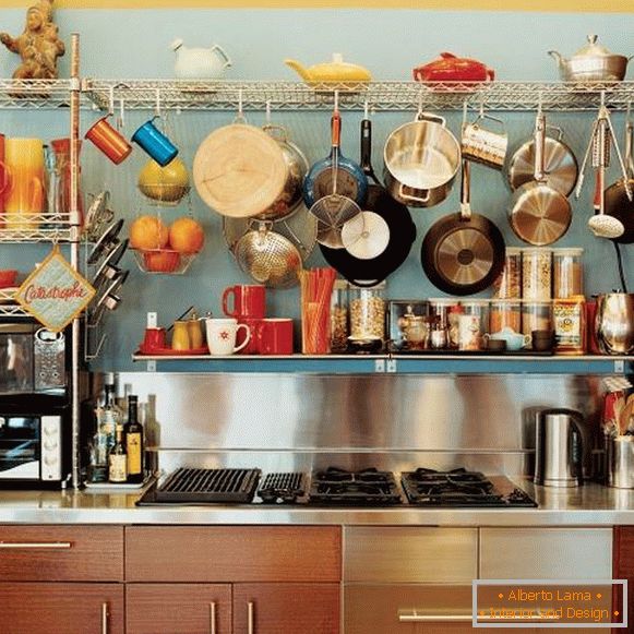 Open shelves with kitchenware in kitchen design