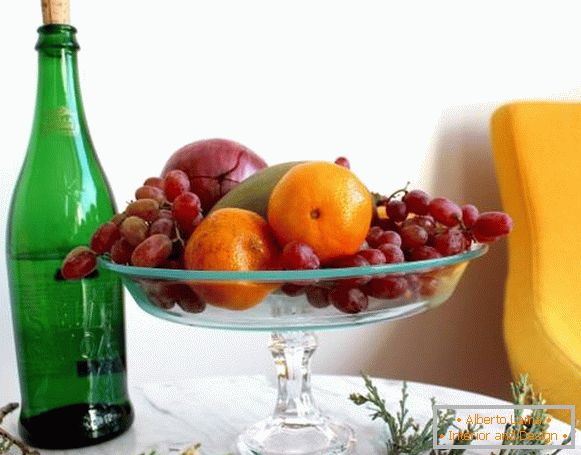 Fruit on a glass stand in kitchen design