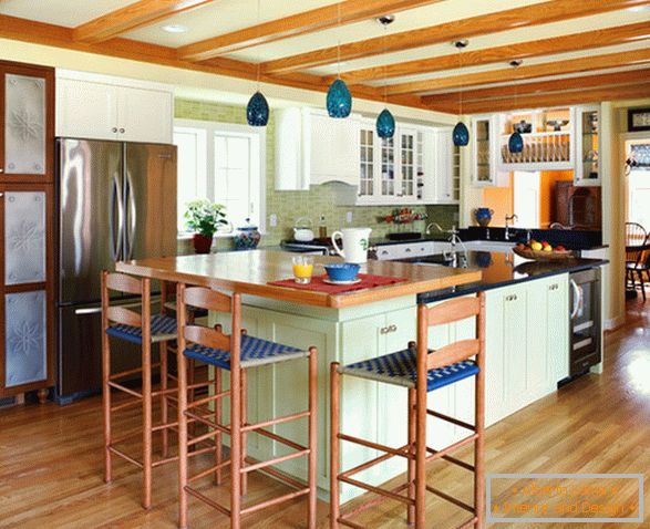 Kitchen with island in the garage