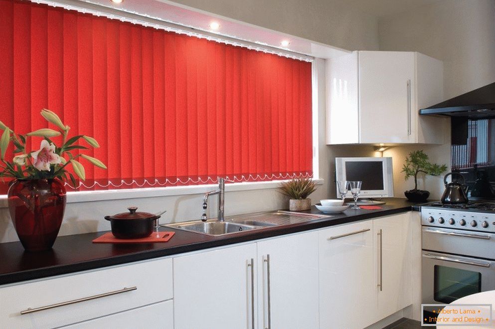 The combination of red blinds and white furniture