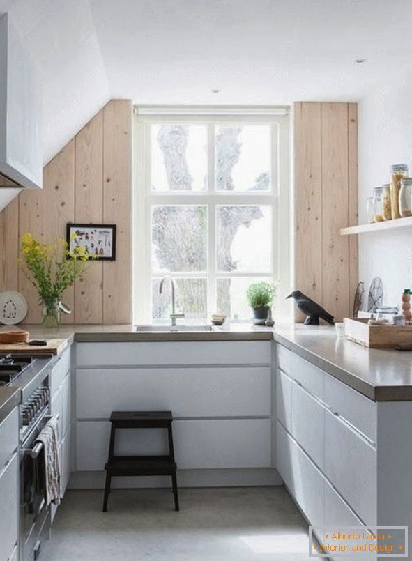 U-shaped kitchen in light colors