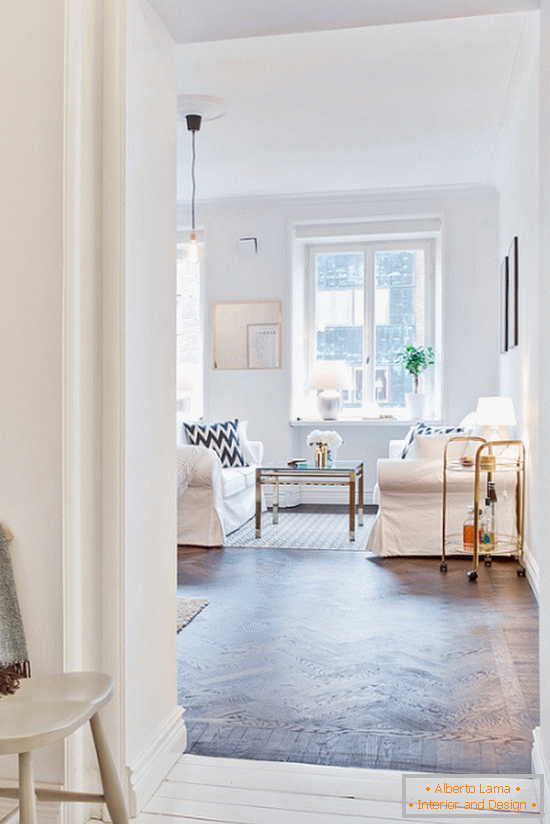 Black accents in the white living room