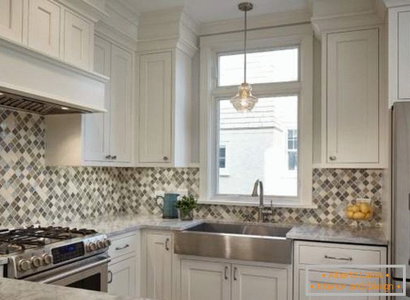 Beige gray apron for white kitchen from tiles