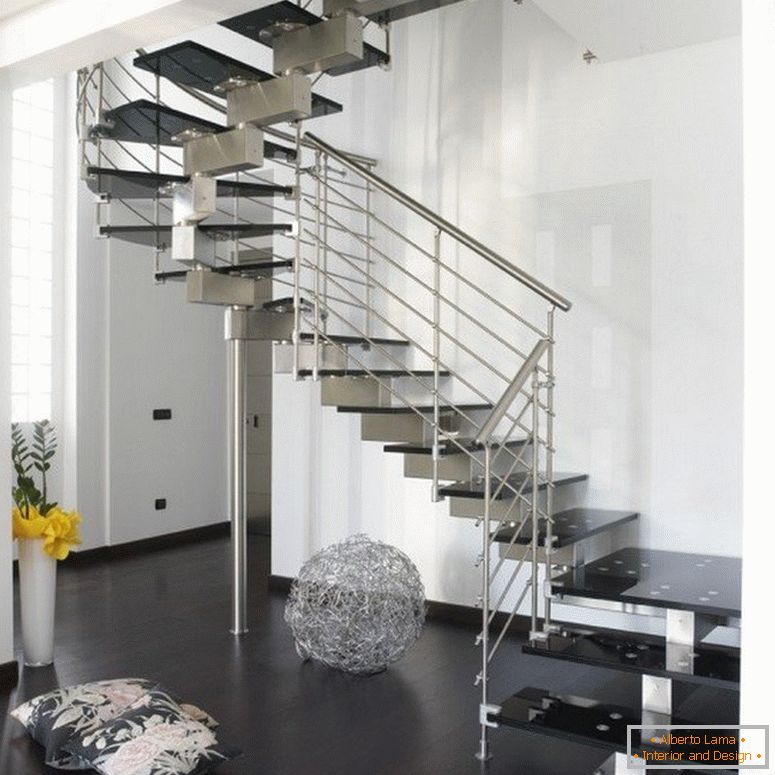Metal staircase in a white room