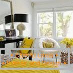 White bedroom with yellow decor