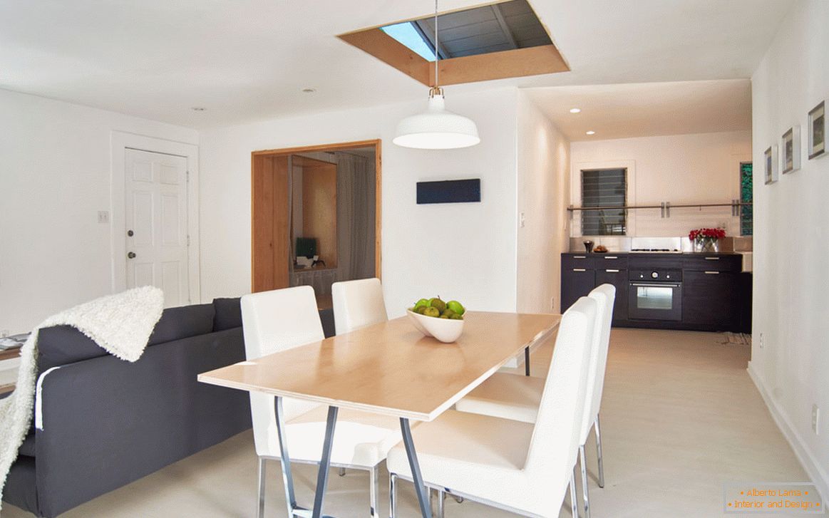 White interior of a small room from Fung House Architects