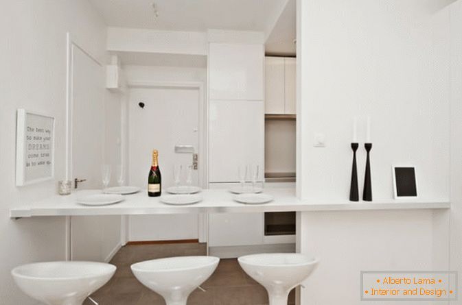 Dining area studio apartment in white color
