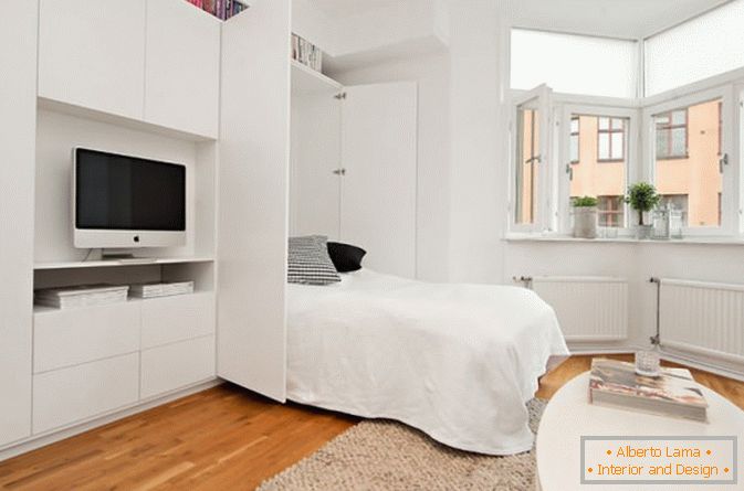 Sleeper studio apartment in white color
