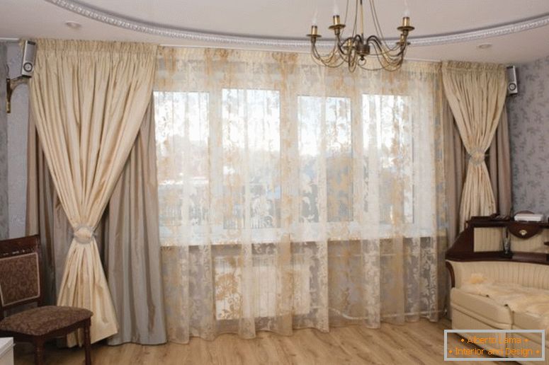 Curtains in the interior of a beige bedroom