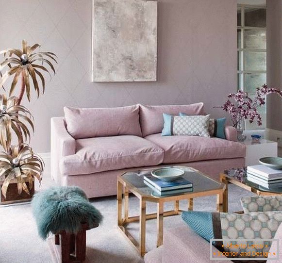 Design of the living room in light pink and blue tones