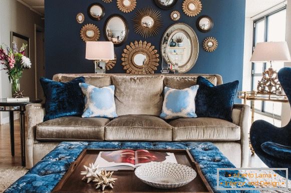 Blue wall and upholstered furniture in the living room
