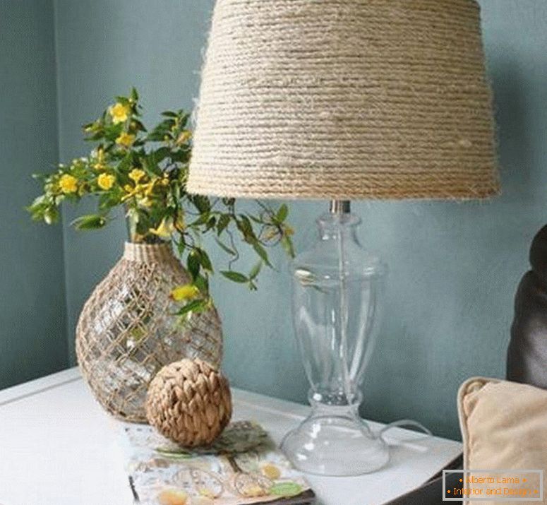 Vase, lamp and magazine on the table