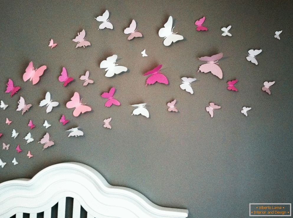 Butterflies made of paper on the wall