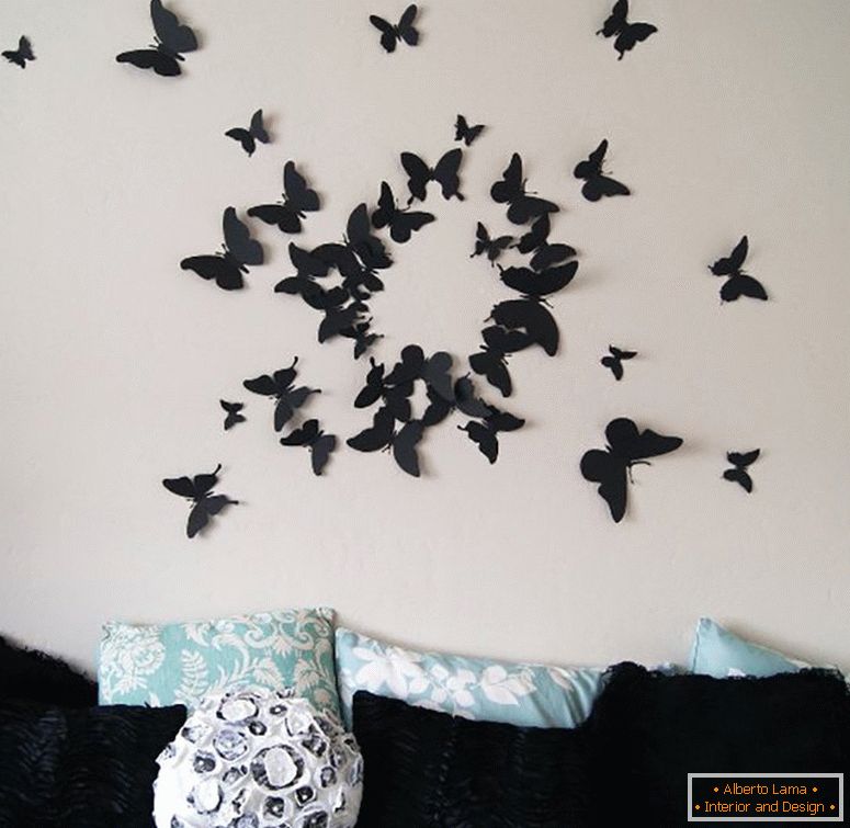 Butterflies made of cardboard over the sofa