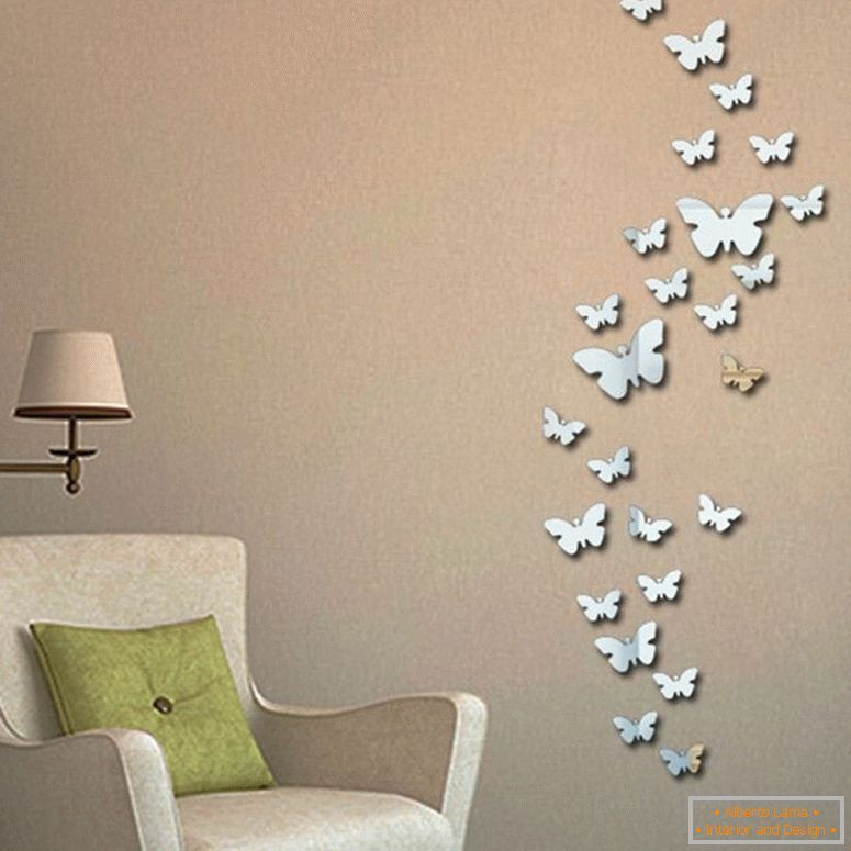 Mirror butterflies on the wall