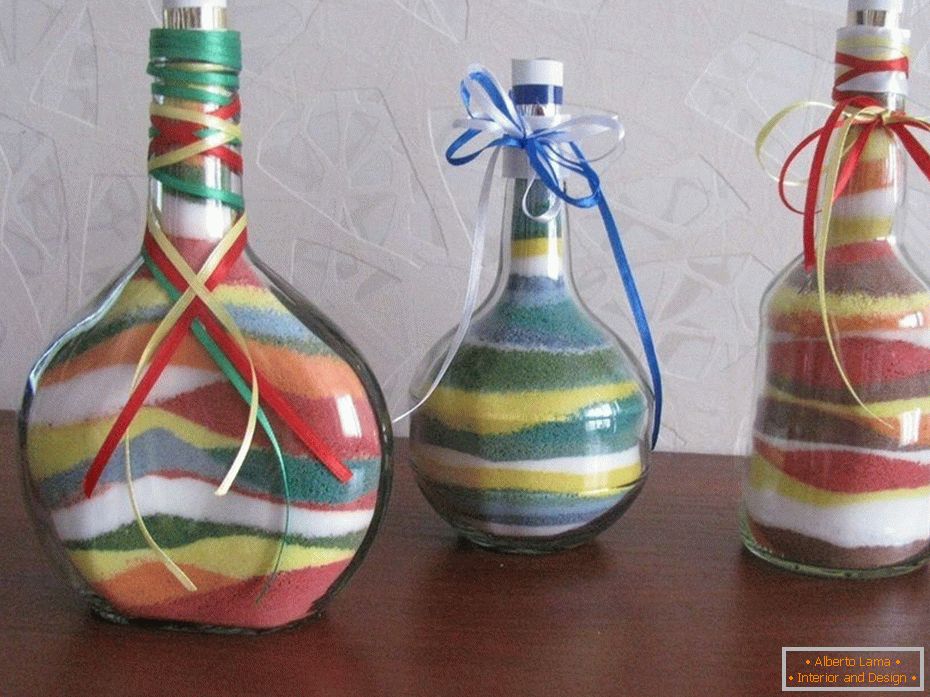 Bottles of different shapes with colored salt