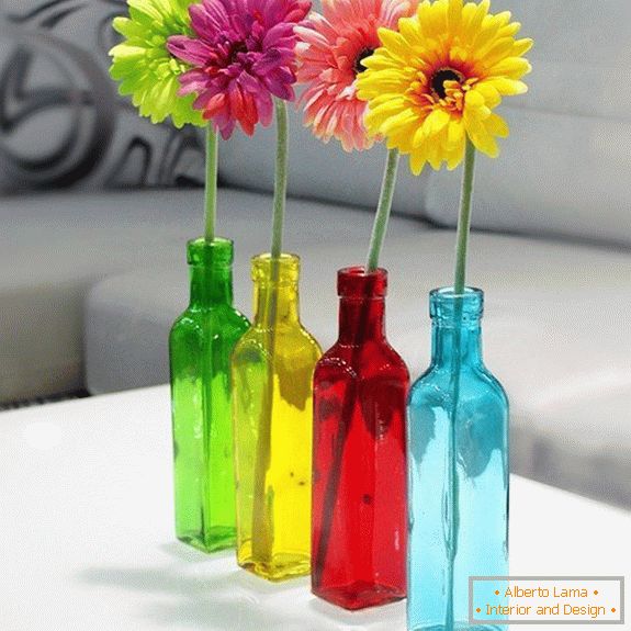 Bottles for flowers from colored glass