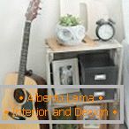 Guitar at the bedside table