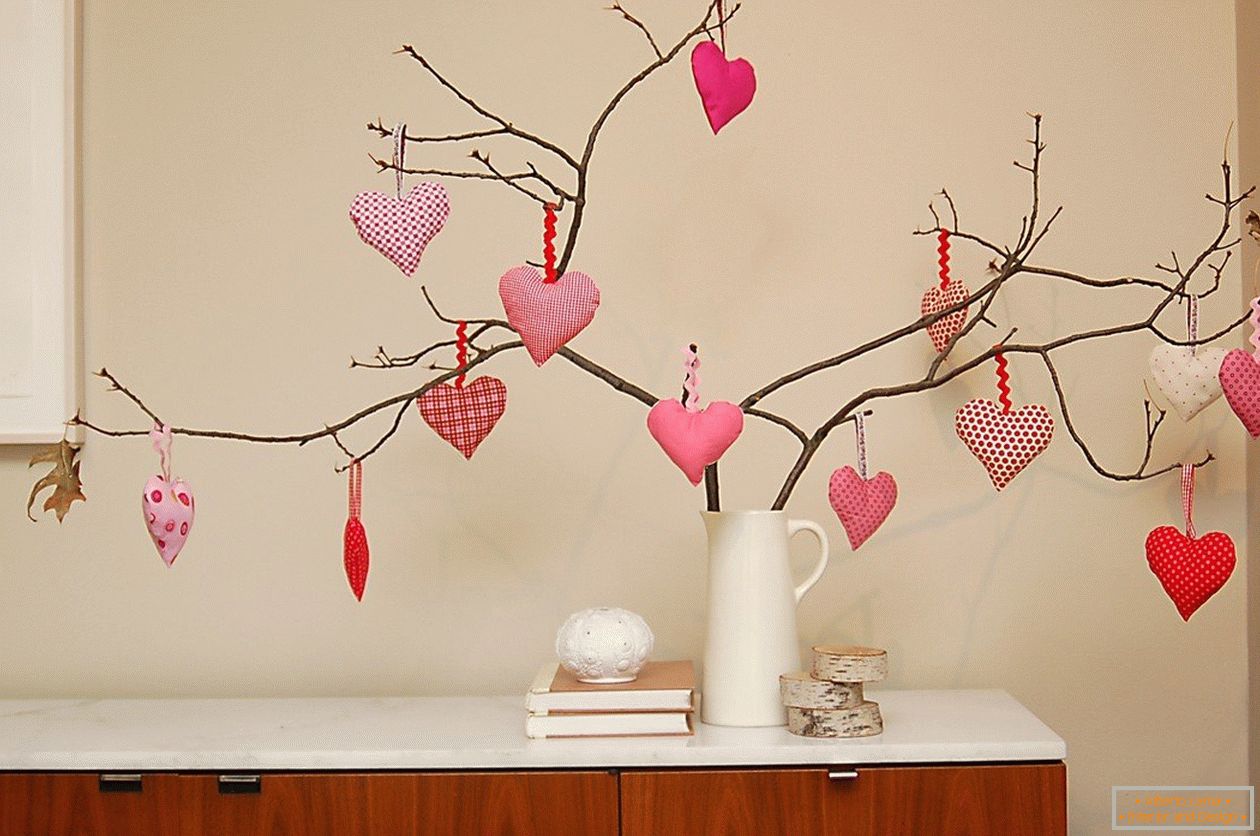 Branches of trees decorated with hearts made of felt