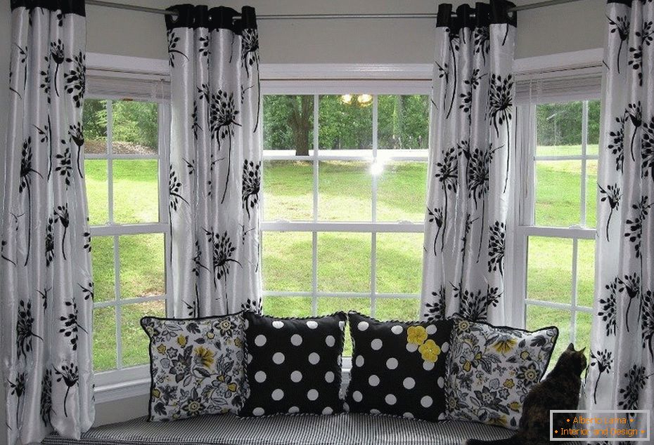 Curtains on the window in the bay window