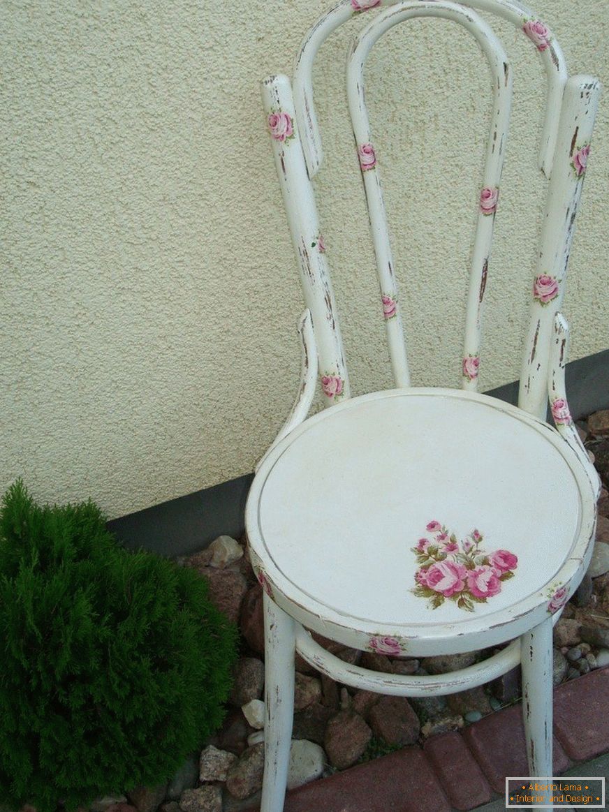 The chair is decorated in the style of Provence