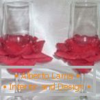 Red rose petals on the glasses