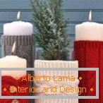 Candles in knitted decor