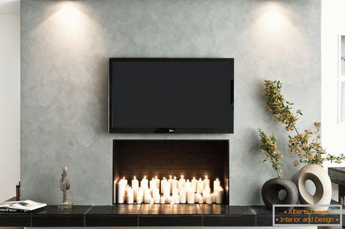 The fireplace in the interior of the living room harmoniously fits into the laconic lines of the high-tech style.