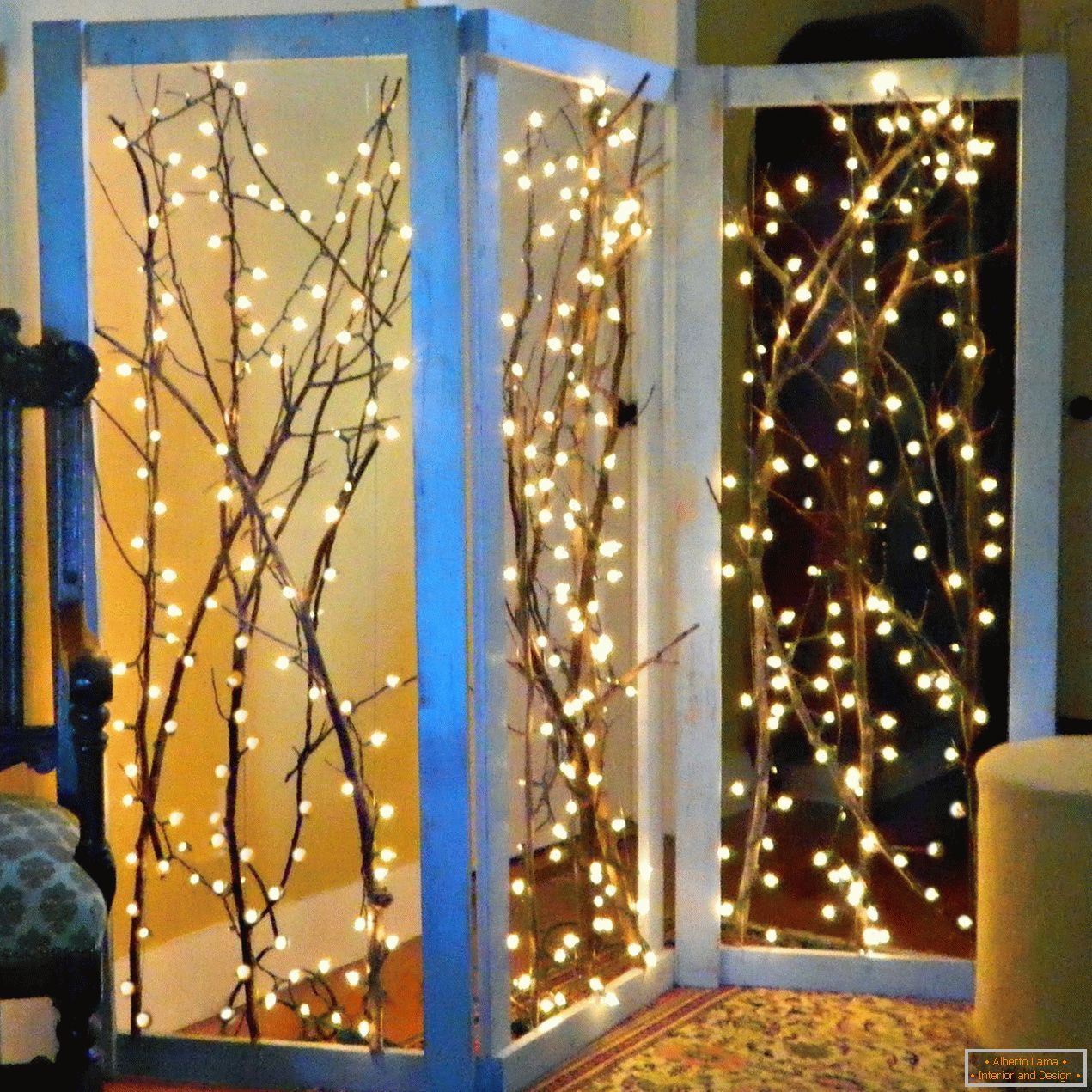A glowing screen made of twigs and garlands