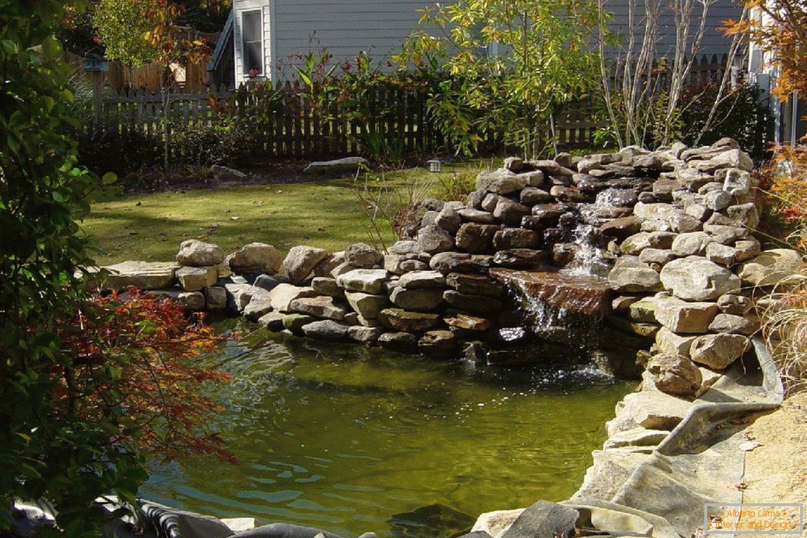 Pond with a waterfall on the site