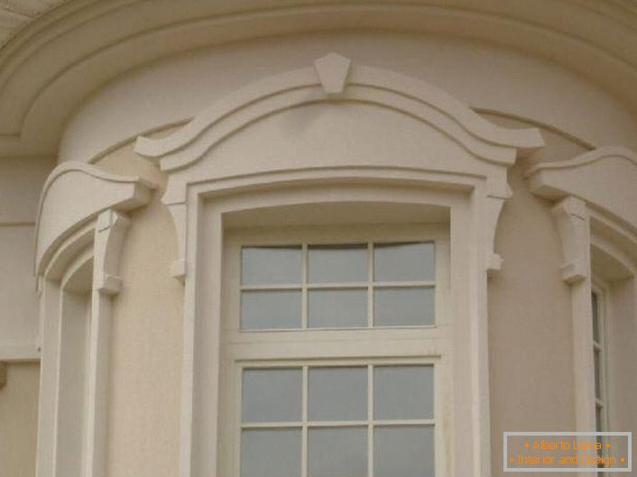 Window frames are made in Art Nouveau style. 