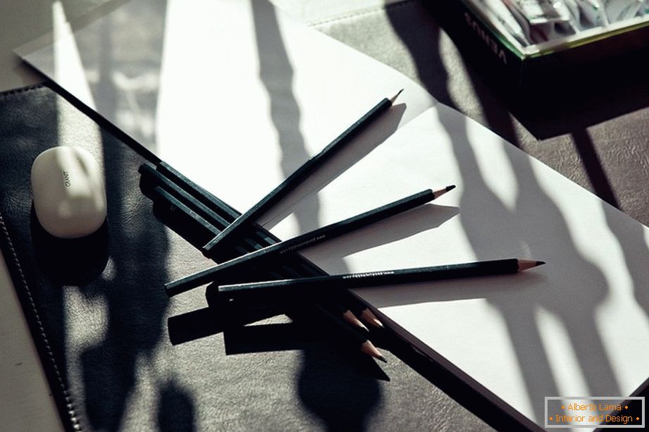 Pencils and paints on the table