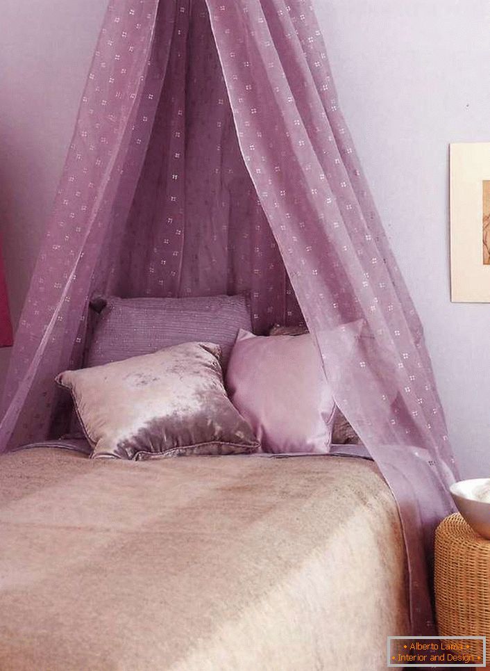 Light, air canopy of light purple color makes the situation in the room romantic and laid-back.
