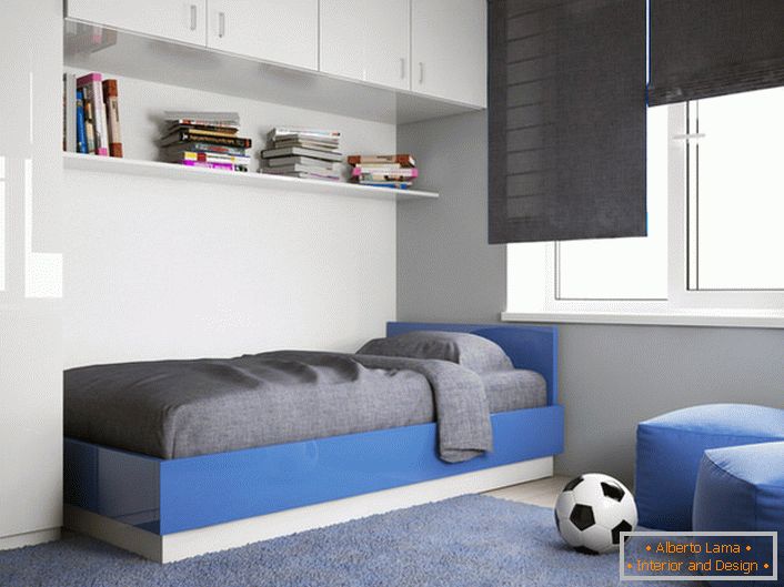 Children's room of a teenage boy is designed in accordance with the requirements of minimalism. 