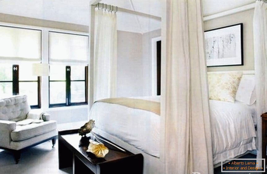 Classic white bedroom with canopy bed