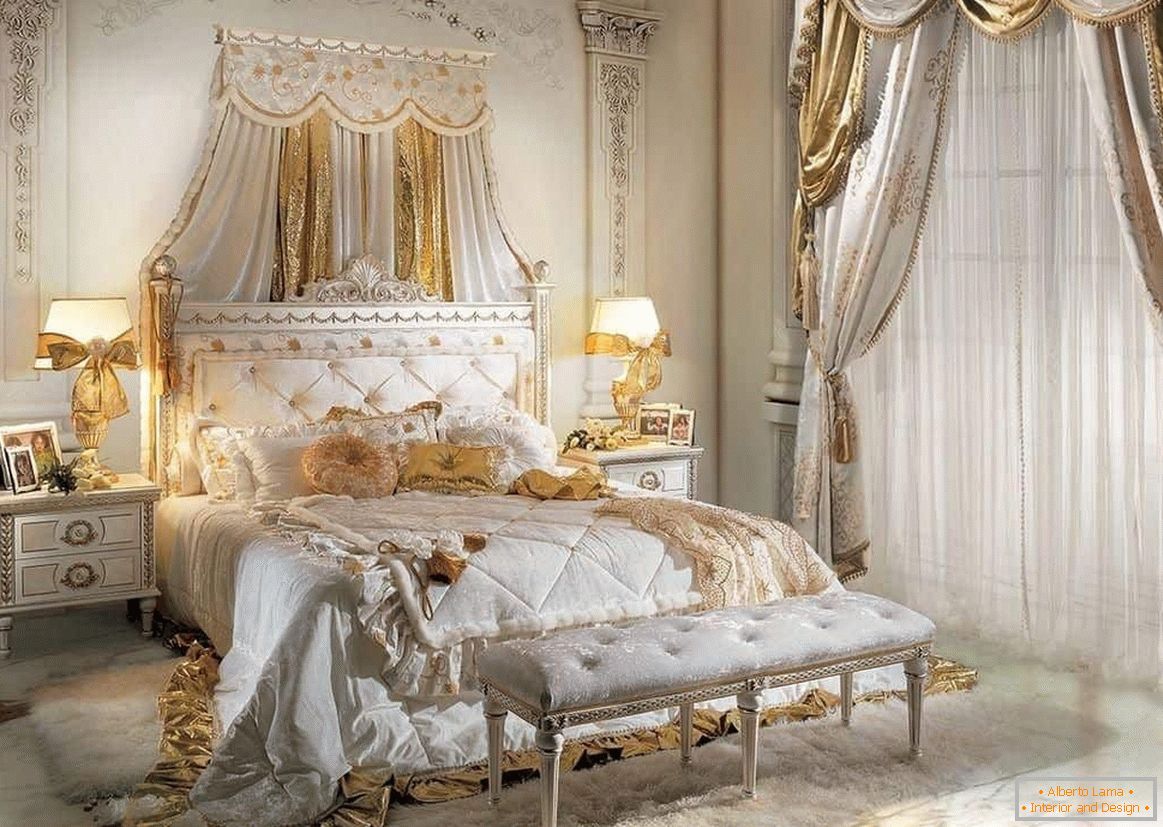 Bed in a classic white bedroom and a wall decorated with stucco