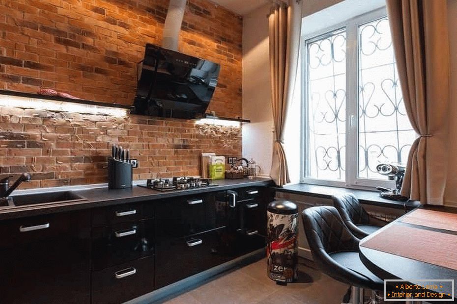 Kitchen with a brick apron without pendant cabinets above the work surface